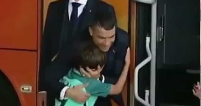 Young fan moved to tears after slipping by security and hugging Cristiano Ronaldo