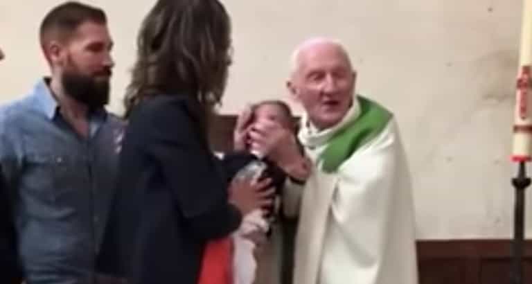 WATCH: Priest loses temper and slaps crying baby during baptismal service WATCH: Priest loses temper and slaps crying baby during baptismal service