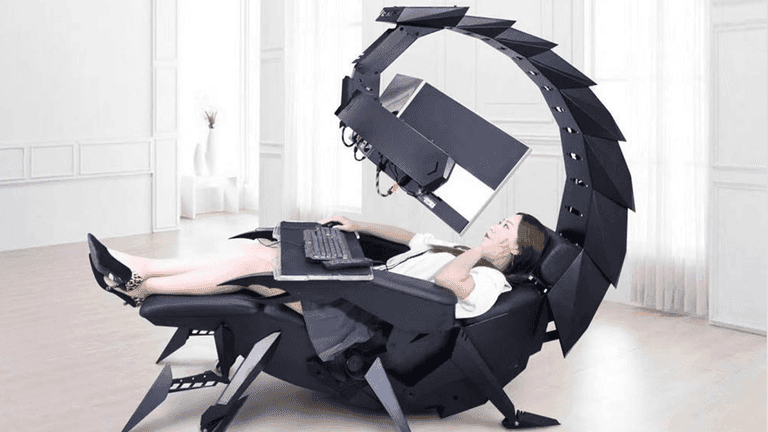 This robotic scorpion gaming chair has a massage seat and can support up to three monitors This robotic scorpion gaming chair has a massage seat and can support up to three monitors