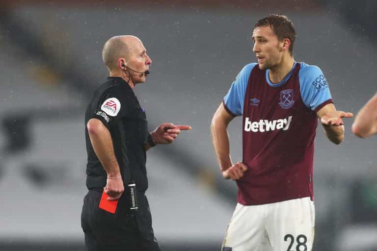 Death threats sent to referee Mike Dean and his family after Soucek red card Death threats sent to referee Mike Dean and his family after Soucek red card