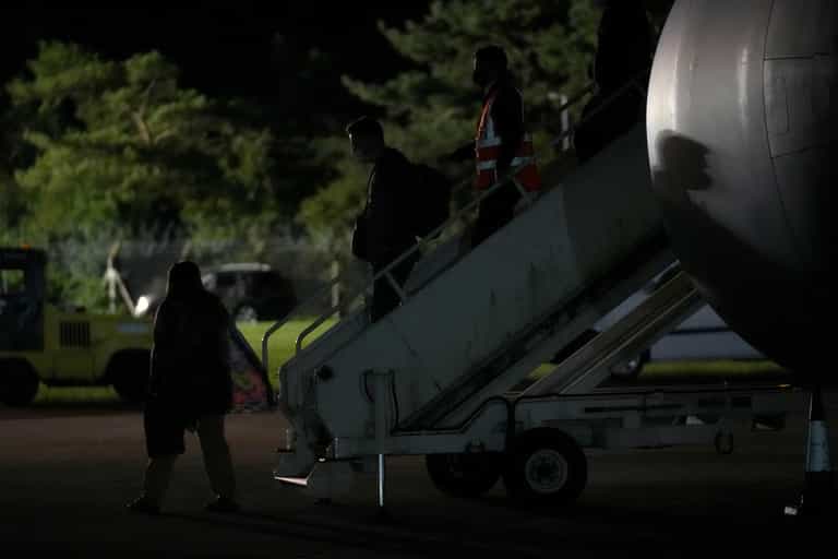First Afghans land in UK after pledge to take in 20,000 refugees