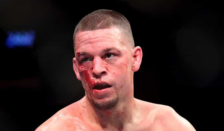 Nate Diaz makes bareknuckle fighter spill his beer with fake punch at Paul-Woodley fight