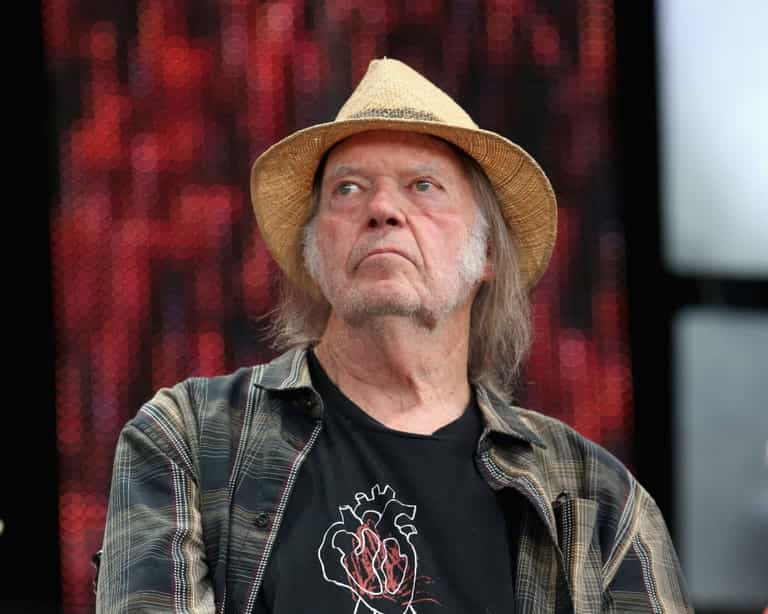 Neil Young encourages Spotify employees to quit and save their souls