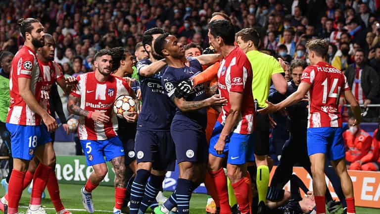 Man City and Atletico Madrid players clash during Champions League tie Man City and Atletico Madrid players clash during Champions League tie