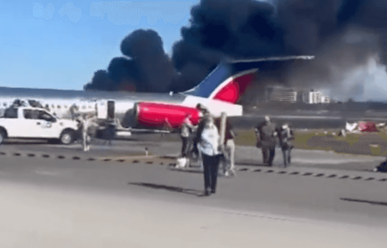 Shocking moment plane crash-lands at Miami Airport and bursts into flames
