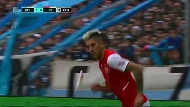 Leandro Fernandez hit in face by fish thrown from the crowd and carried off on a stretcher