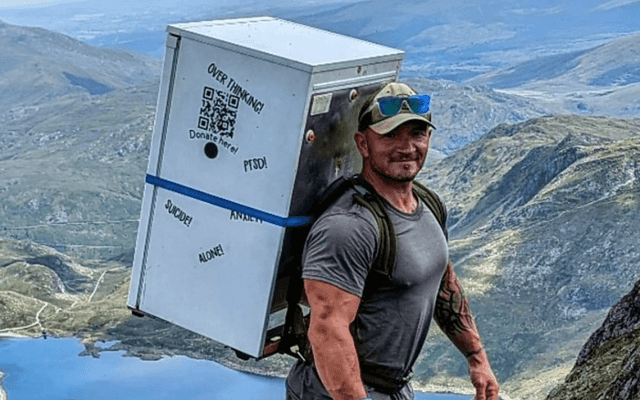 Man carries fridge on back up Snowdon all for charity