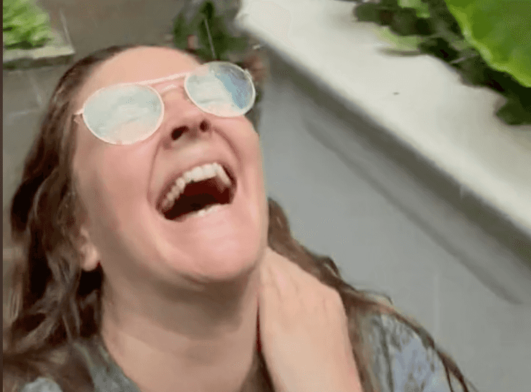 Drew Barrymore branded racist after posting video of her dancing in the rain