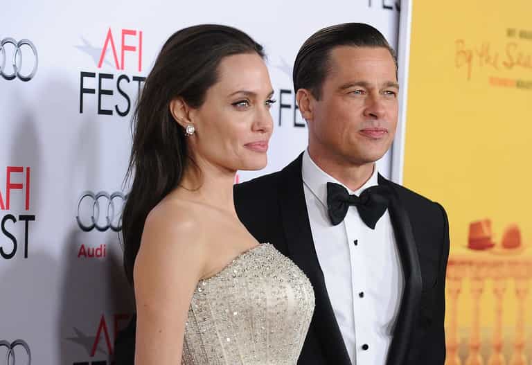 Brad Pitt choked one of his children and hit another in the face on private plane, Angelina Jolie claims