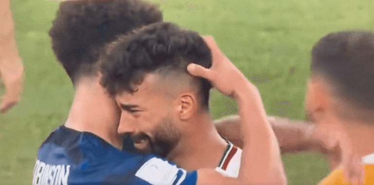 US player Antonee Robinson lauded for hugging heartbroken Iranian opponent US player Antonee Robinson lauded for hugging heartbroken Iranian opponent