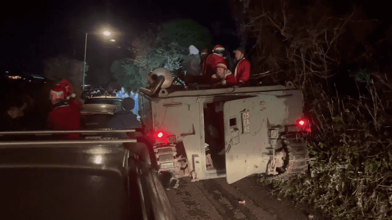 Police called after tank full of Santas caused chaos by getting stuck down village lane during pub crawl