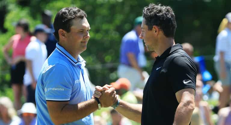 Patrick Reed throws a tee at Rory McIlory after snub in Dubai Patrick Reed throws a tee at Rory McIlory after snub in Dubai