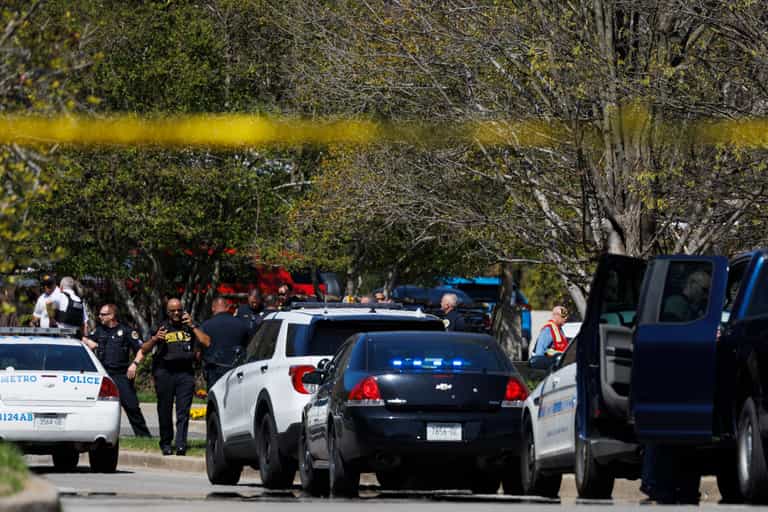 Chilling CCTV shows Nashville school shooter storm building armed with assault rifles before killing six