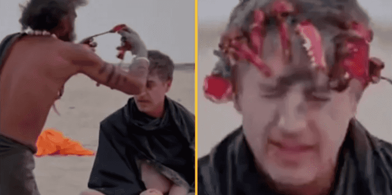 Reporter eats ‘human brain’ with cannibal tribe while wearing crown made out of teeth