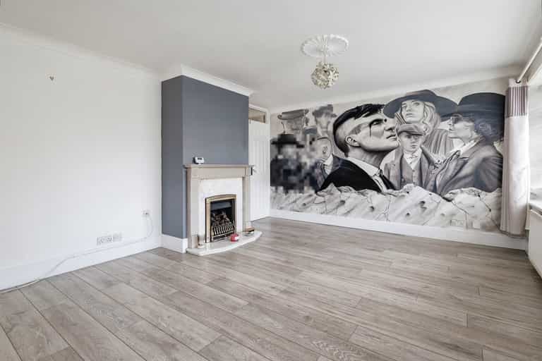 Three-bedroom home up for sale with unique feature – a huge Peaky Blinders mural