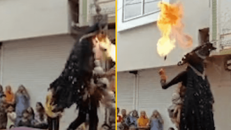 Terrifying moment performer’s face catches fire during fire-breathing stunt