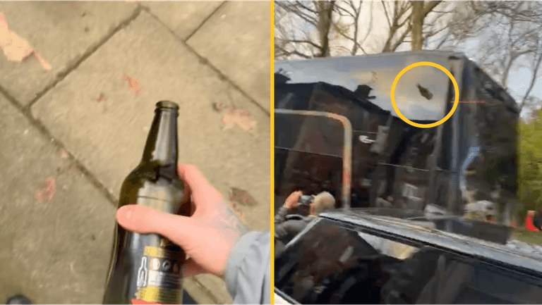 Liverpool on manhunt after fan throws bottle at Man United bus