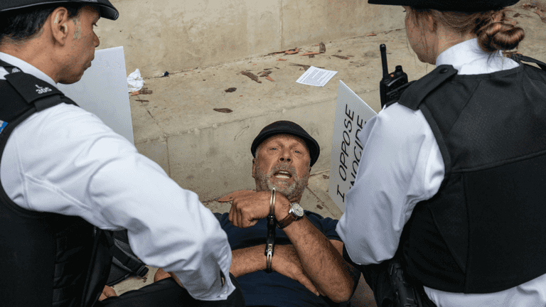 Police arrest more than 20 people as Palestine Action banned as terrorist organisation Police arrest more than 20 people as Palestine Action banned as terrorist organisation
