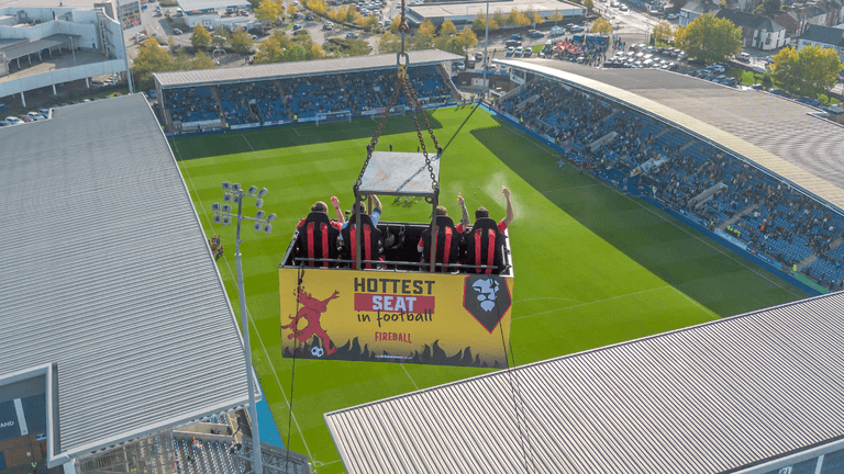 Football fans raised 50m in the air so that they can drink while looking at the pitch