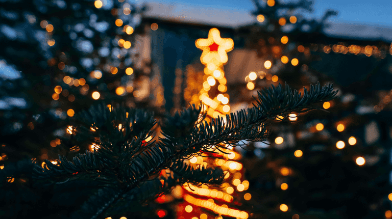 Council threatens to cancel Christmas lights unless flags are taken dow