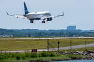 Plane carrying over 100 people collides with drone while landing