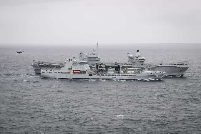 Jets scrambled to intercept Russian plane ‘dropping devices’ near UK flagship carrier