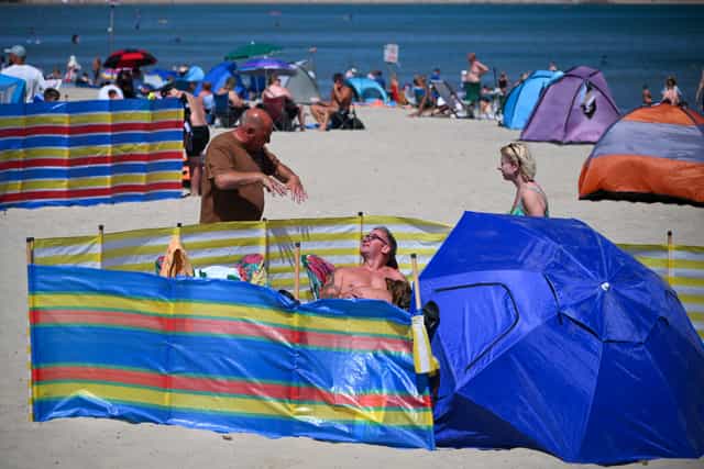 UK heatwave: amber warning as temperatures near 38C