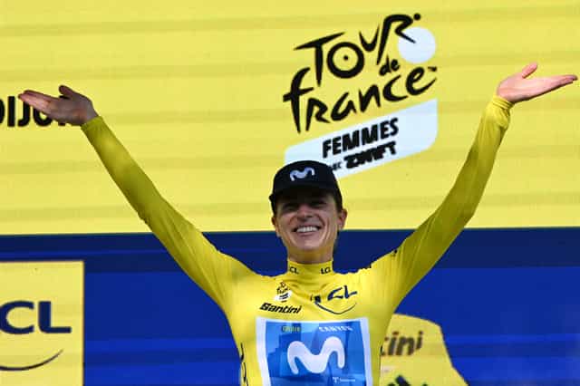 Reusser wins time trial to take tour lead