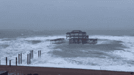 Historic pier partially collapses into sea as Storm Austen batters UK