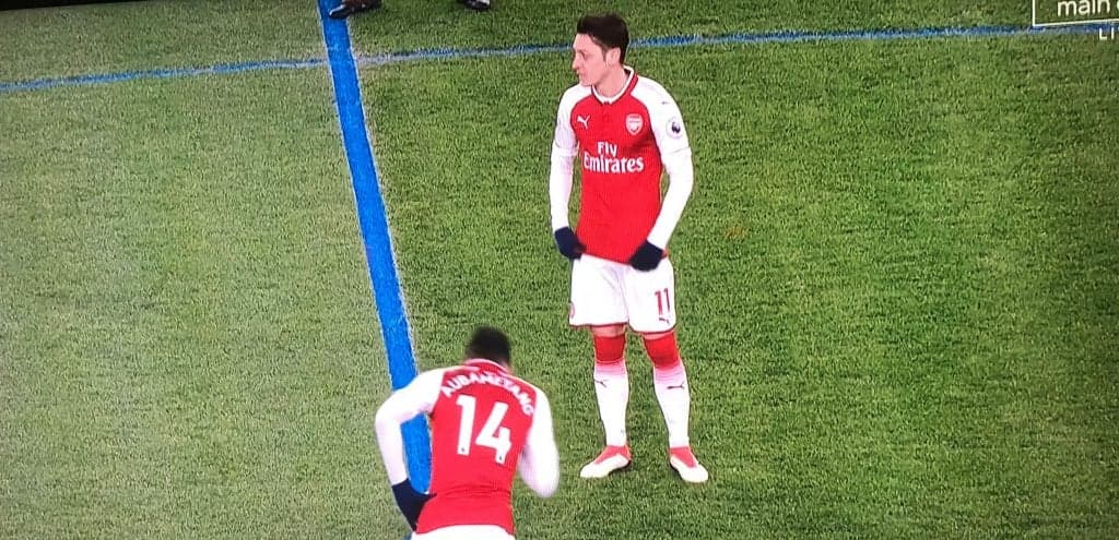 This is why the pitch markings in the Arsenal vs Man City match are blue