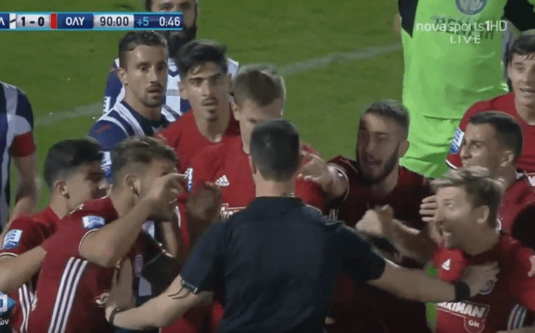Olympiakos player pulls off dive of the year after “push” from referee Olympiakos player pulls off dive of the year after “push” from referee
