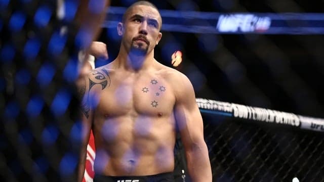 Robert Whittaker’s chin steals the show in 10-8less victory over Yoel Romero Robert Whittaker’s chin steals the show in 10-8less victory over Yoel Romero