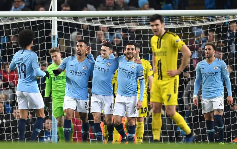 Man City put nine goals Burton Albion in first leg of League Cup semi-final Man City put nine goals Burton Albion in first leg of League Cup semi-final