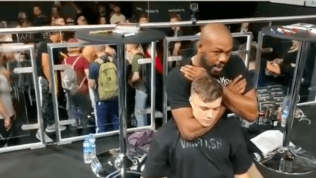 Jon Jones chokes out fan during fitness event in Germany Jon Jones chokes out fan during fitness event in Germany