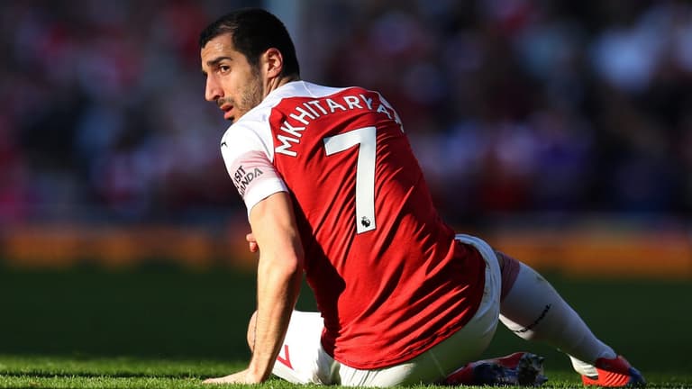 Police in Baku stop Arsenal fans wearing Henrikh Mkhitaryan jerseys Police in Baku stop Arsenal fans wearing Henrikh Mkhitaryan jerseys