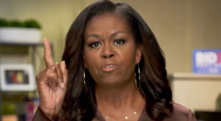 Michelle Obama tells Americans to vote for Biden “like our lives depend on it” Michelle Obama tells Americans to vote for Biden “like our lives depend on it”