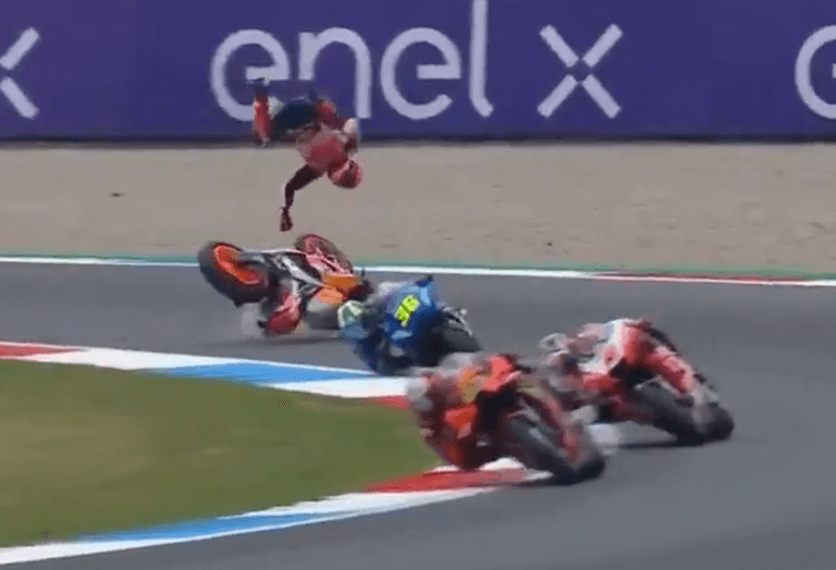 MotoGP racer somehow limps away after being flung from bike in dramatic crash MotoGP racer somehow limps away after being flung from bike in dramatic crash