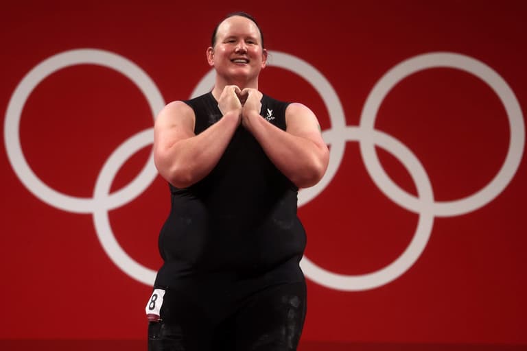 First trans Olympian Laurel Hubbard given ovation after first-round knock out First trans Olympian Laurel Hubbard given ovation after first-round knock out