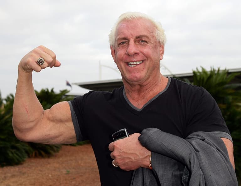 Ric Flair denies giving woman oral sex on train after picture goes viral Ric Flair denies giving woman oral sex on train after picture goes viral