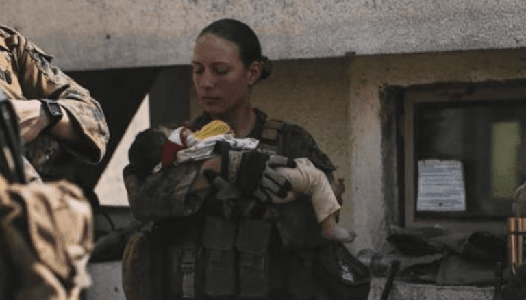 US Marine’s heartbreaking final Instagram post shows her caring for Afghan children before being killed US Marine’s heartbreaking final Instagram post shows her caring for Afghan children before being killed