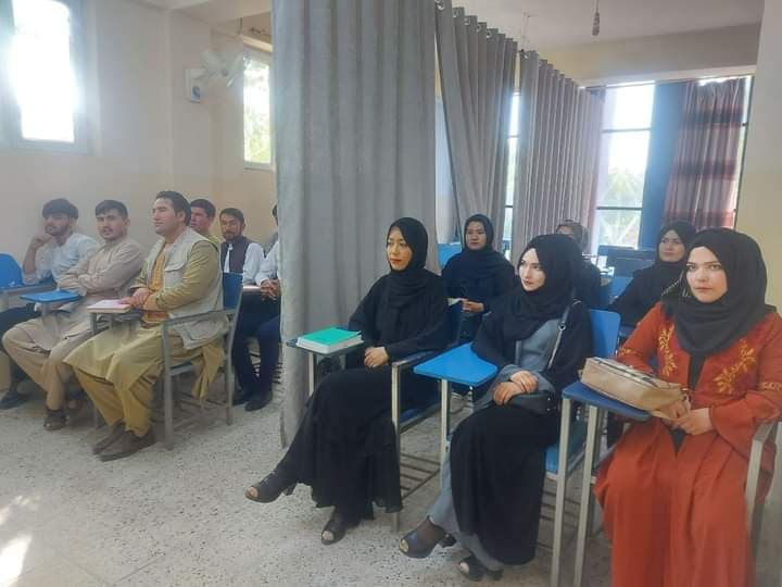 Taliban hides female students behind curtain as Afghan universities return Taliban hides female students behind curtain as Afghan universities return