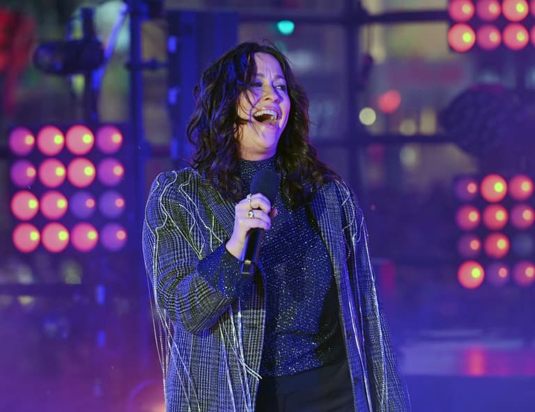 Alanis Morissette claims she was raped by multiple men when she was 15 Alanis Morissette claims she was raped by multiple men when she was 15