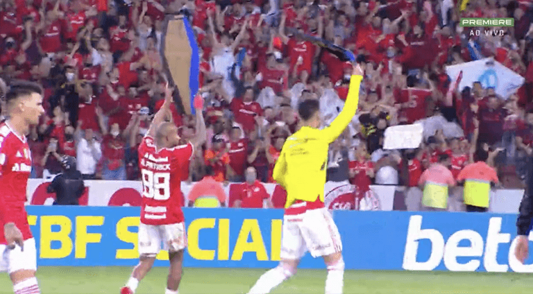 Internacional players lift fake coffins after beating rivals Gremio in derby match Internacional players lift fake coffins after beating rivals Gremio in derby match
