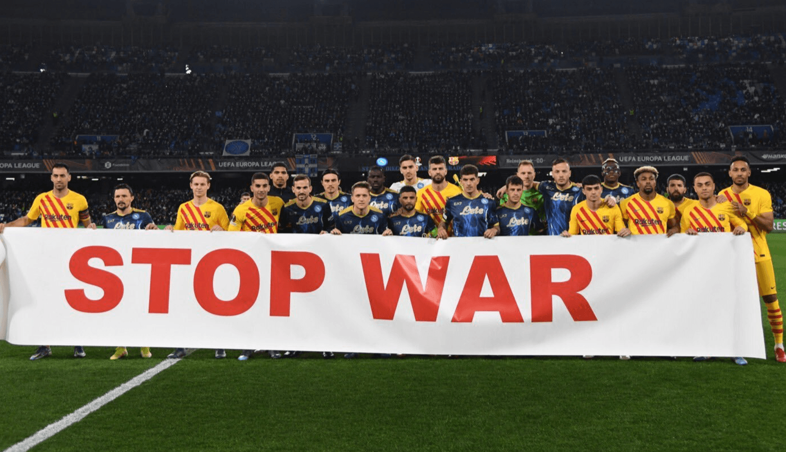 Barcelona and Napoli players reveal banner reading ‘Stop war’ before Europa League fixture