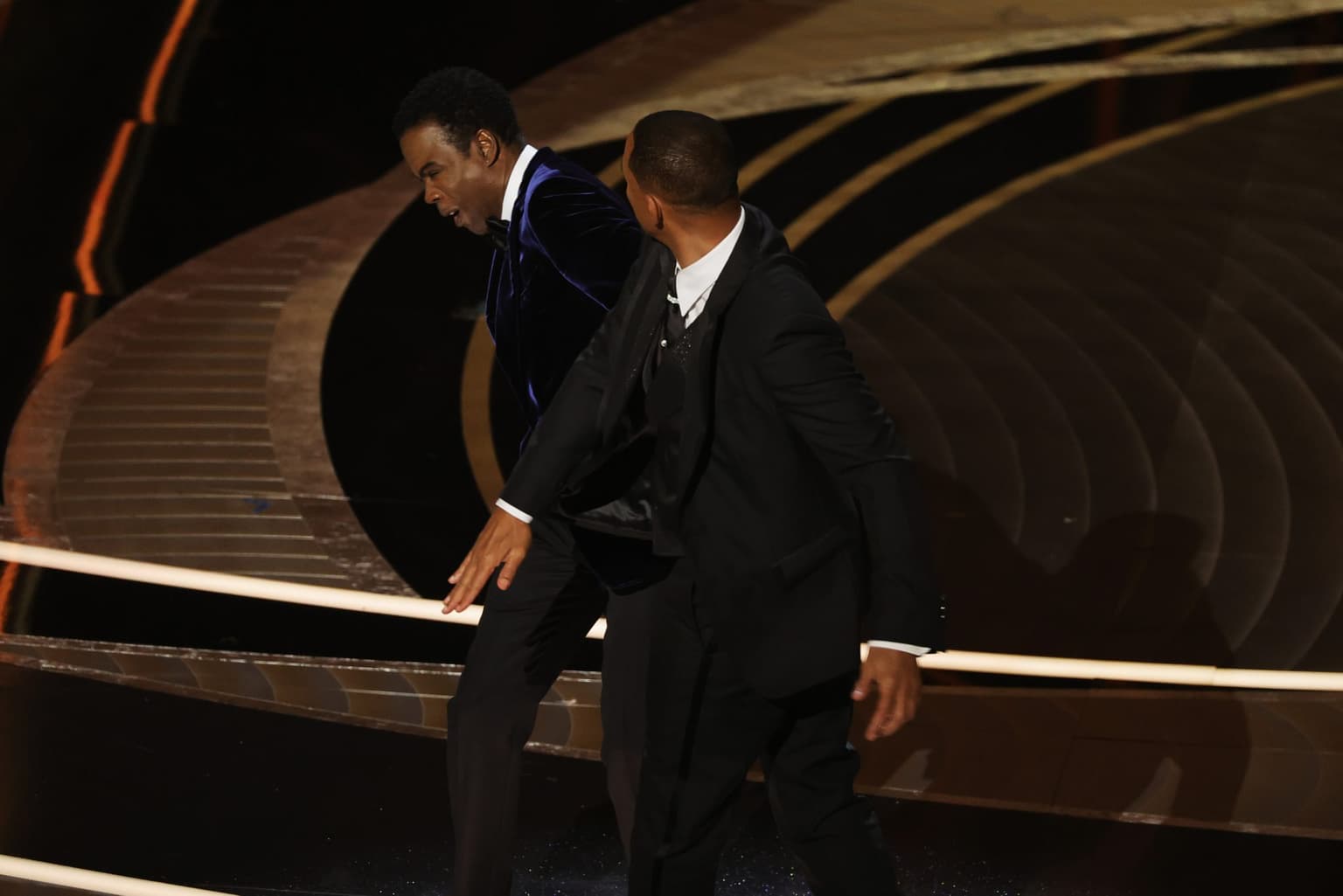 Red carpet prankster who was slapped by Will Smith speaks out after Chris Rock beef