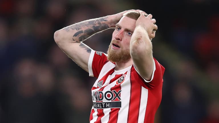 Oli McBurnie denies stamping on Forest fan despite damning video Oli McBurnie denies stamping on Forest fan despite damning video