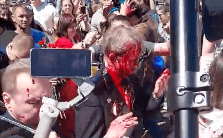 Russian ambassador left red-faced after being attacked with paint by crowd shouting ‘fascist’ Russian ambassador left red-faced after being attacked with paint by crowd shouting ‘fascist’