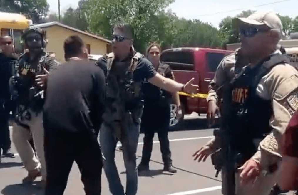 Moment parents beg police to stop Texas gunman as cops stood outside school during shooting