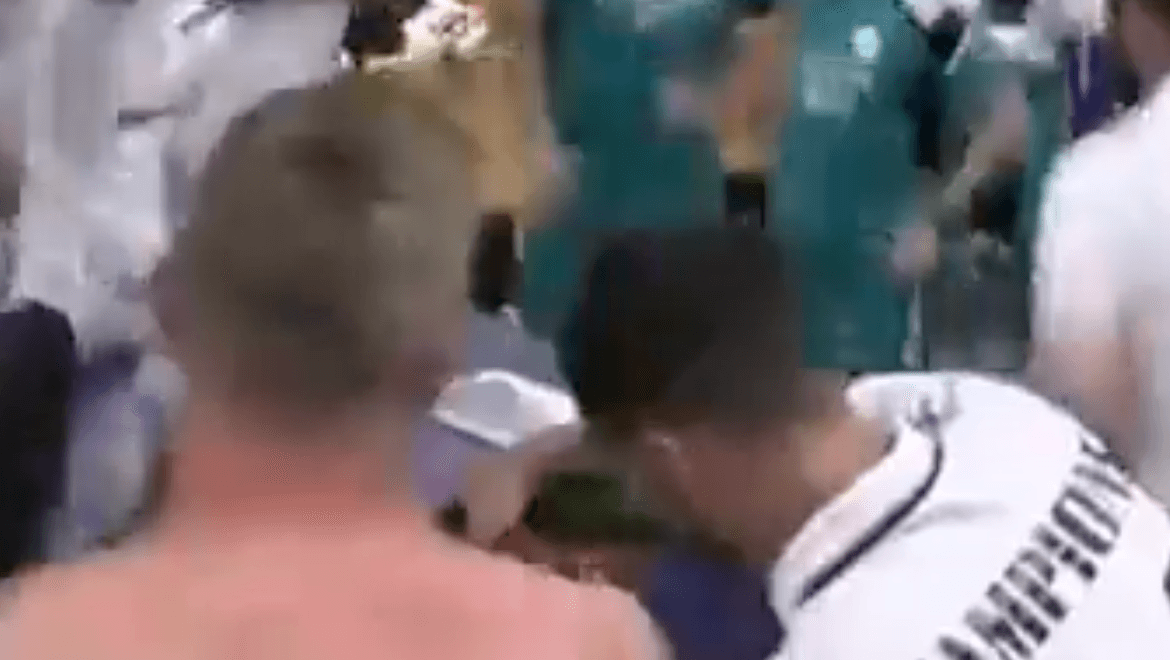 Toni Kroos stops Eden Hazard pouring champagne for son during celebrations