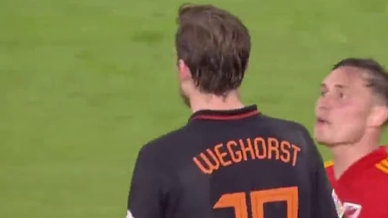 Connor Roberts confronts Burnley teammate Wout Weghorst during Nations League clash